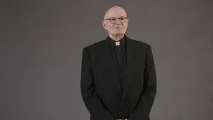 Headshot photo of William E. Reiser, S.J.