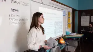 Holy Cross student teach a class at Worcester East Middle School