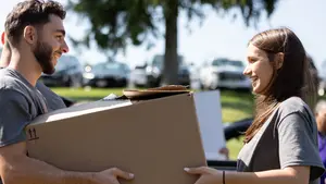 Students moving boxes on move-in day