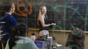 Izzy van der Spuy ’26 studies with her physics classmates in Haberlin 126, known as the “fishbowl”, in the Integrated Science Complex at the College of the Holy Cross on April 30, 2025.