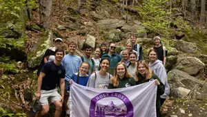 The Holy Cross Outdoor Club poses for a photo