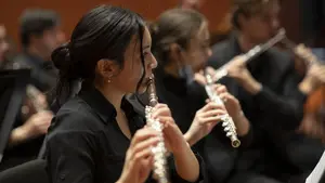 The Holy Cross Orchestra rehearses before celebrating the 50th Anniversary of Coeducation with a concert at the Luth Concert Hall on November 16, 2022 at the Prior Performing Arts Center in Worcester, Massachusetts.