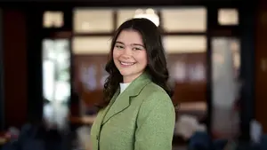 Louisa Malchodi poses for a headshot at Holy Cross